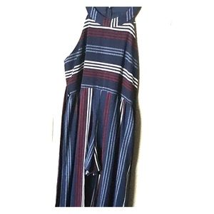 Romper with strips and tail draping